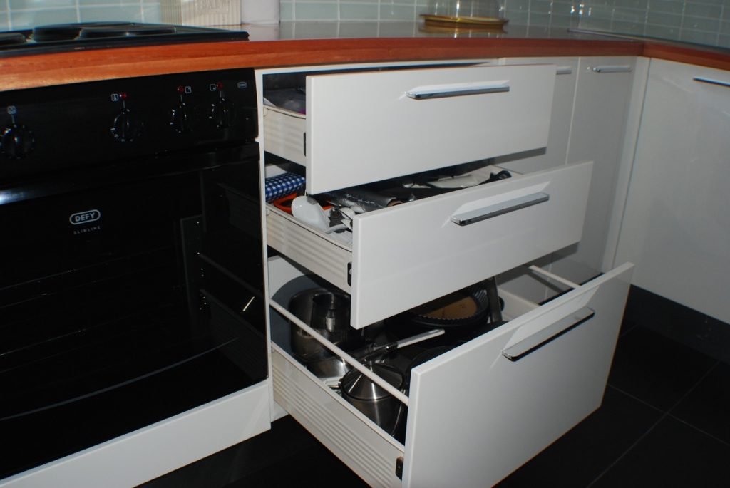 HiGloss white sprayed doors with solid Saligne worktop