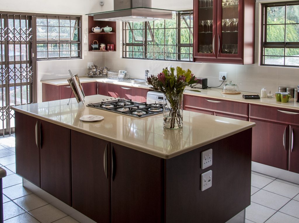 Port Maple wrap doors with Biscuit Ceasarstone tops