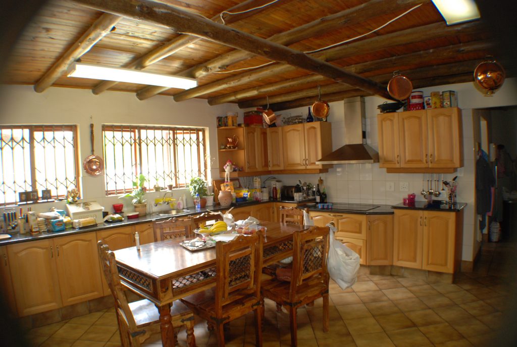 Farmhouse kitchen - solid beech doors with Rustenberg granite