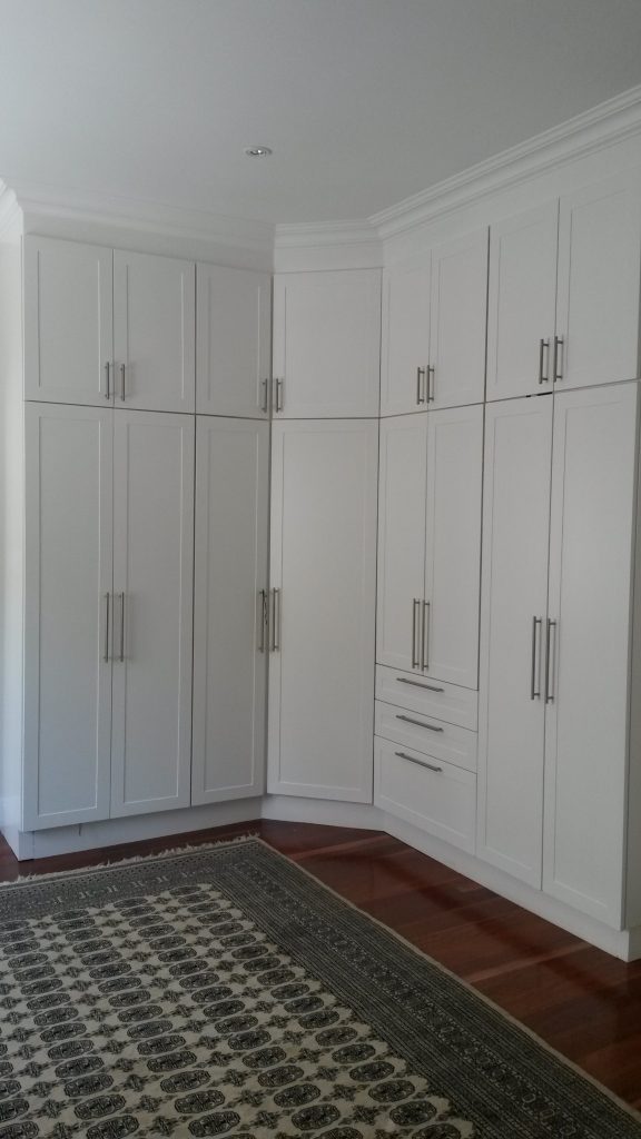 Hand painted shaker doors with space for TV and multiple drawers