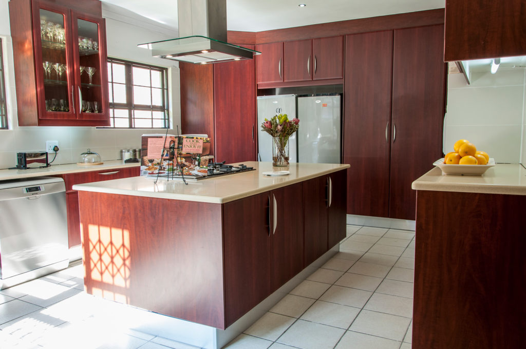 Port Maple wrap doors with Biscuit Ceasarstone tops