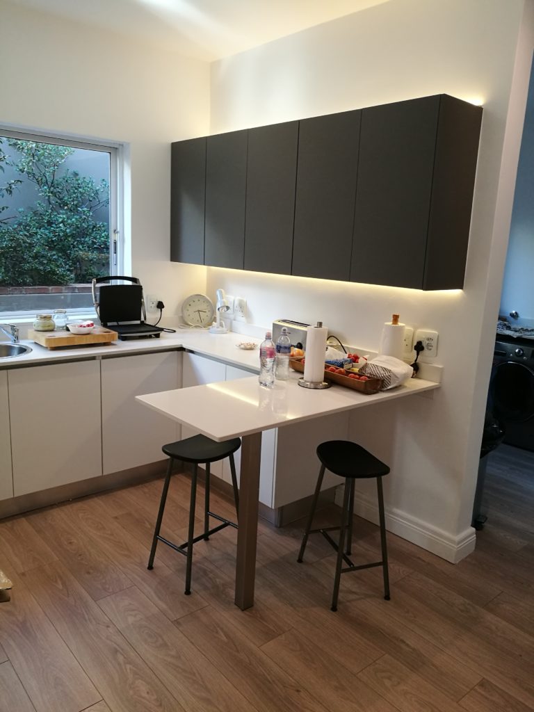 Storm Grey/White  combo Acrylic doors with Speckle Quartz work tops